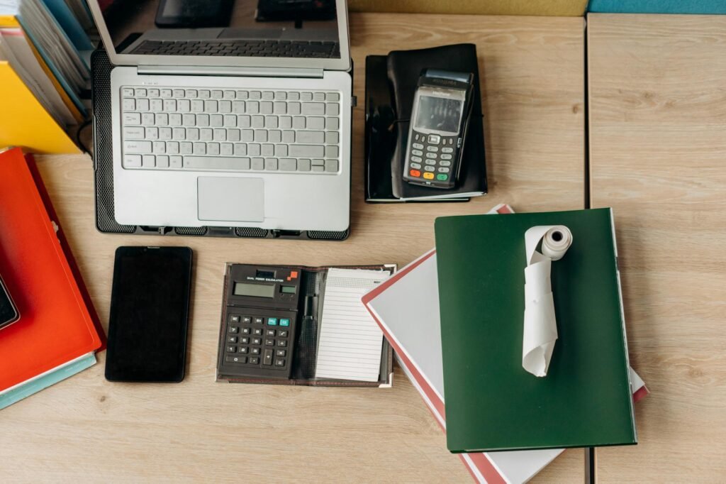 Organized desk with bike documents, a receipt, and notes about a serial number